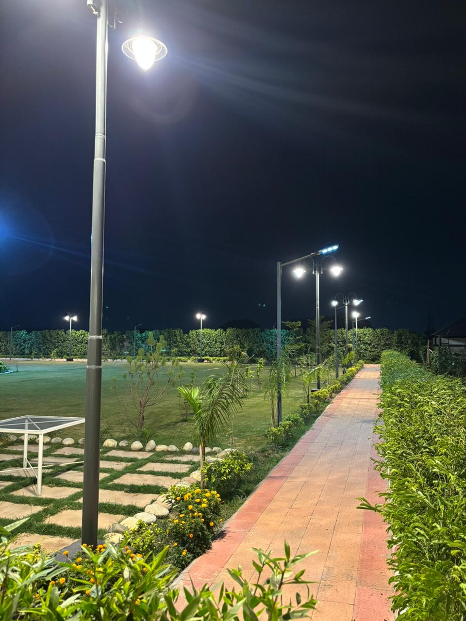 Lit pathway with ping pong table